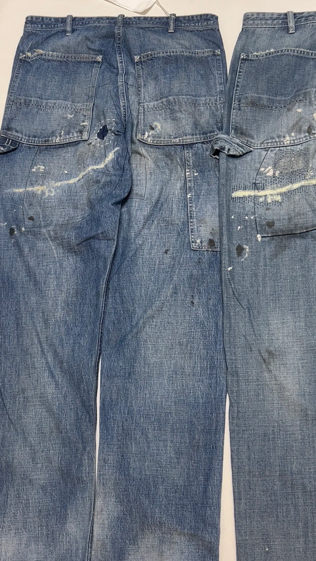 Proofing VS ZP SAINT Mxxxxxx SAINT_DENIM PANTS/PAINTER /BLUE Knife cut holes and splashed ink logging trousers Patch jeans Blue S-XL All accessories are molded and customized Super heavy work Washed and worn Knife cut holes Artificial ink splashed graffiti Genuine version Loose and stylish